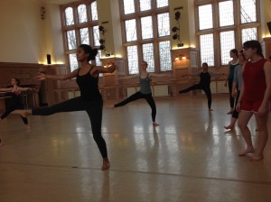 The dancers in Carrie's class practice balancing/shifting weight while maintaining still, upright torsos